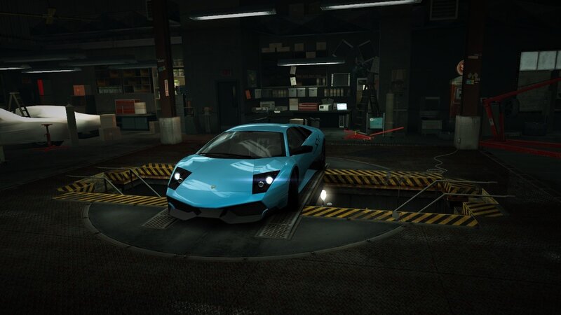 Blue sports car in garage