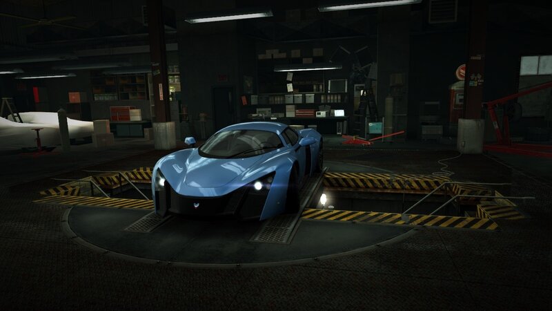 blue sports car in garage