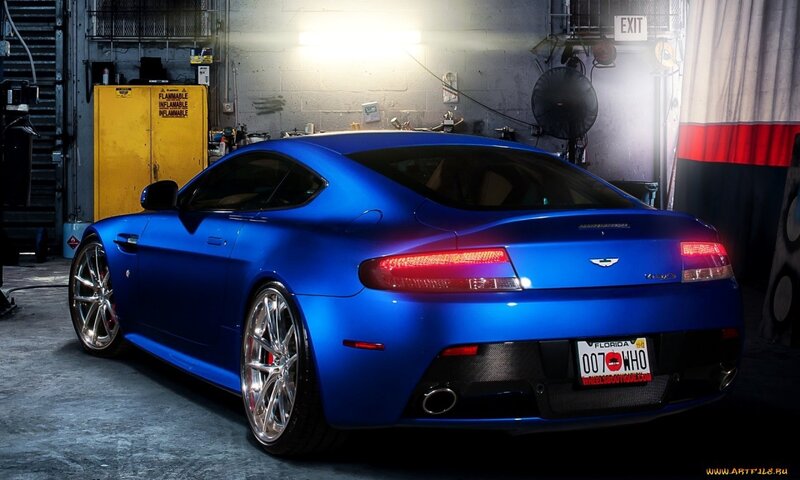 blue sports car in garage
