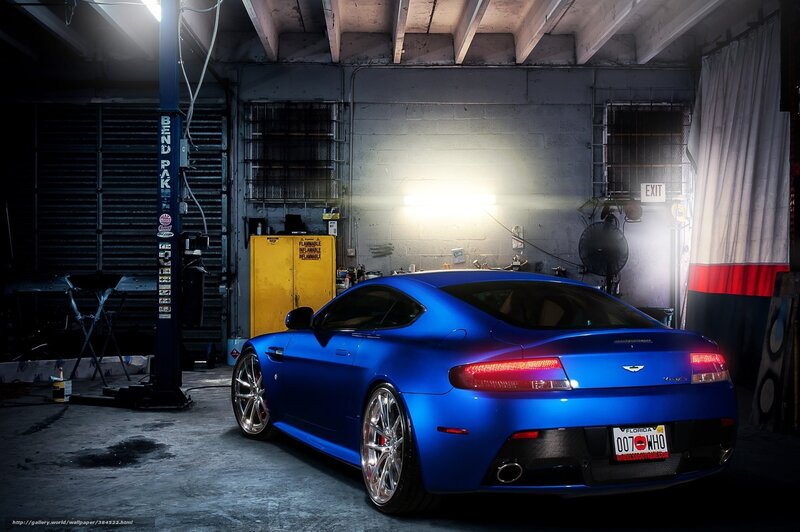 Blue sports car in garage