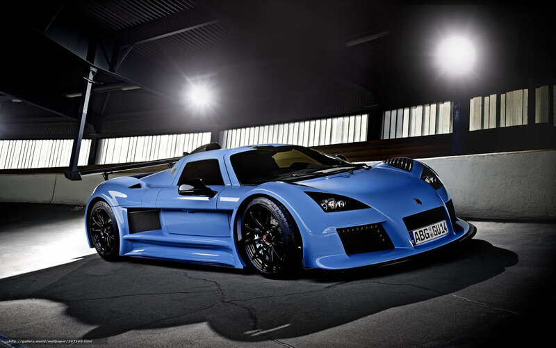 Blue sports car in garage