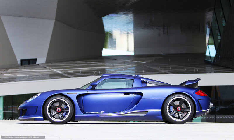 blue sports car in modern architecture
