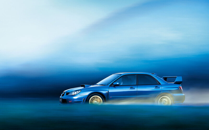 blue sports car in motion