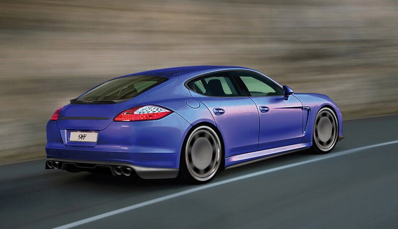 blue sports car in motion