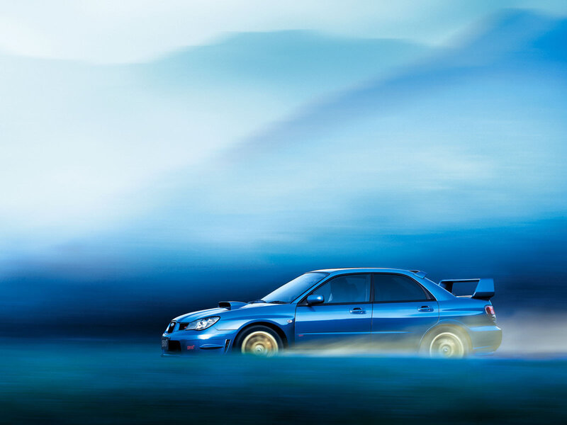 Blue sports car in motion