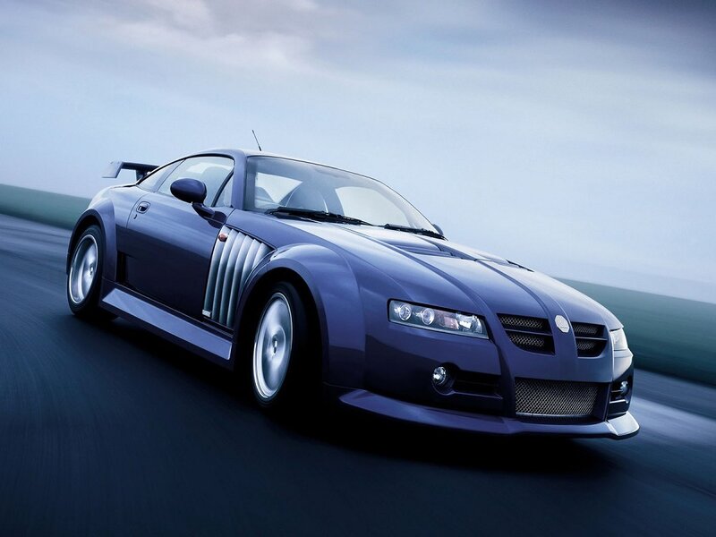 blue sports car in motion