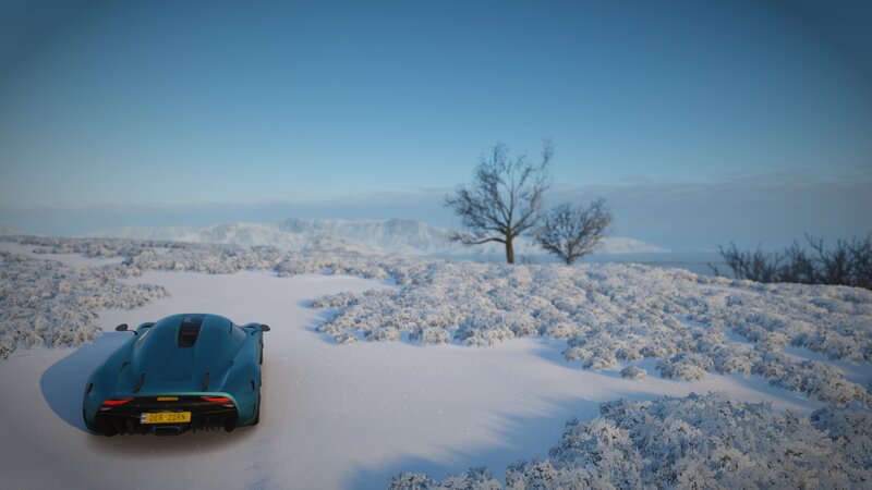 Blue Sports Car in Snow — Serene