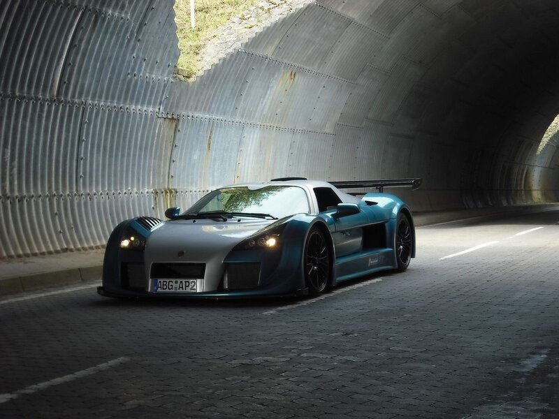 Blue sports car in tunnel