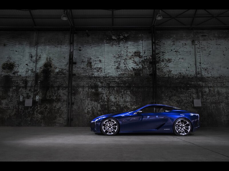 Blue sports car in warehouse