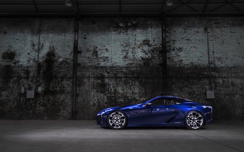 Blue sports car in warehouse