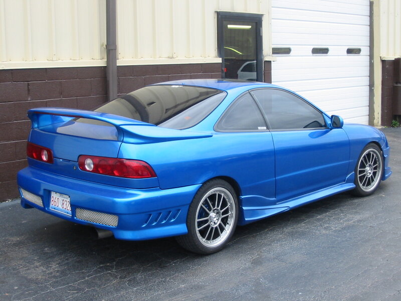 Blue Sports Car — Neutral, Afternoon, Photograph, Building