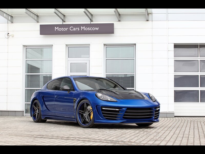 Blue Sports Car — Neutral, Afternoon, Photograph, Building, Windows, Pavement