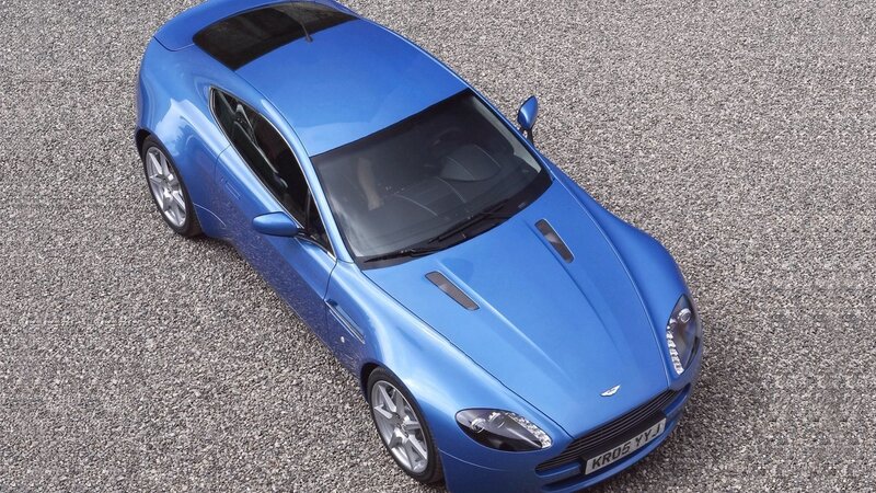 Blue Sports Car — Neutral, Photograph, Gravel Surface, Side Mirror