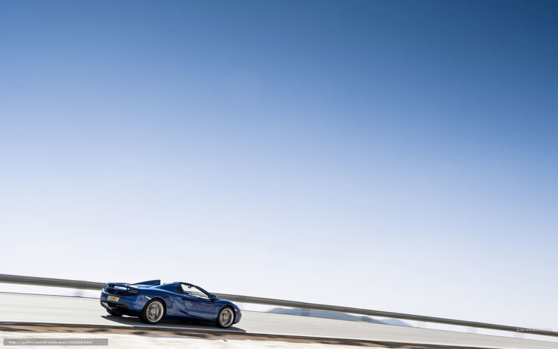 Blue sports car on a highway