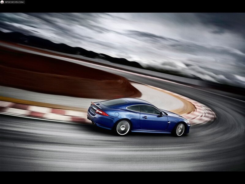 Blue sports car on a racetrack