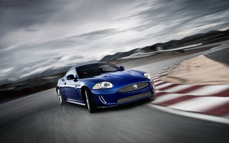 Blue sports car on a racetrack