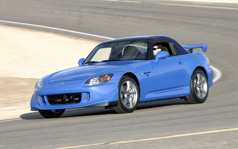 Blue sports car on a racetrack