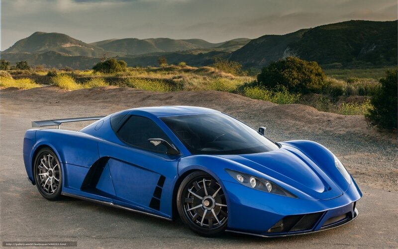 Blue sports car on a road