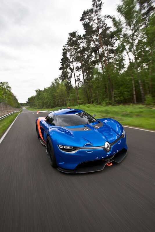 Blue sports car on a road