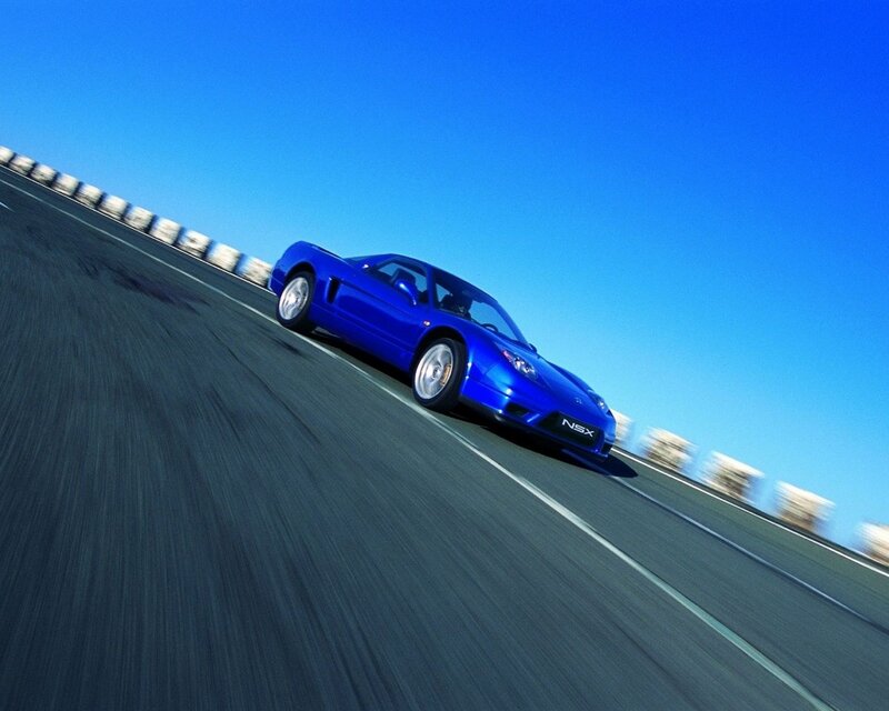 Blue sports car on a track