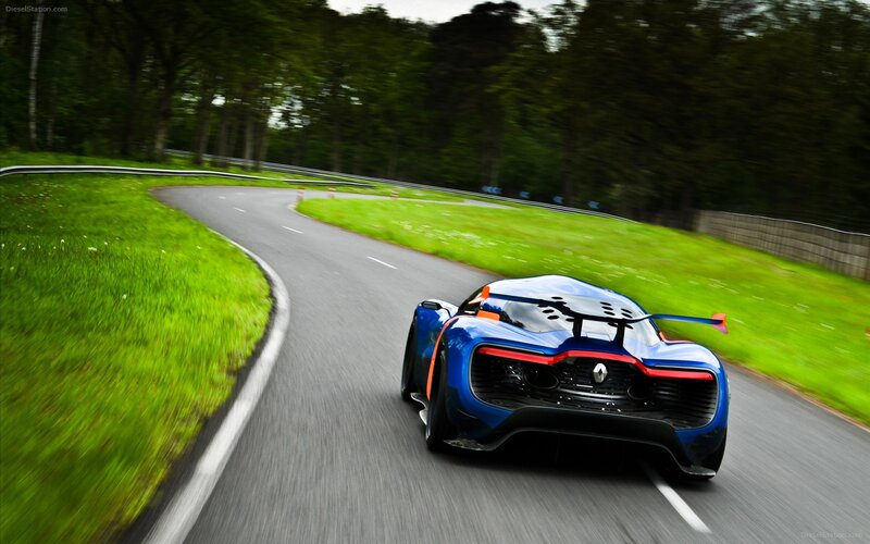 blue sports car on a winding road