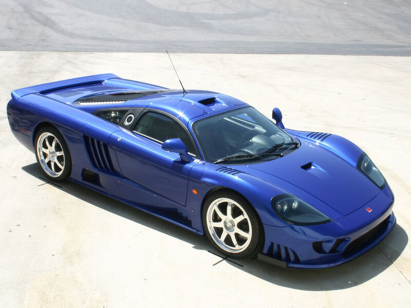 Blue sports car on concrete
