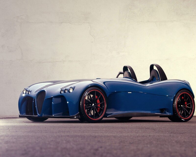 blue sports car on concrete