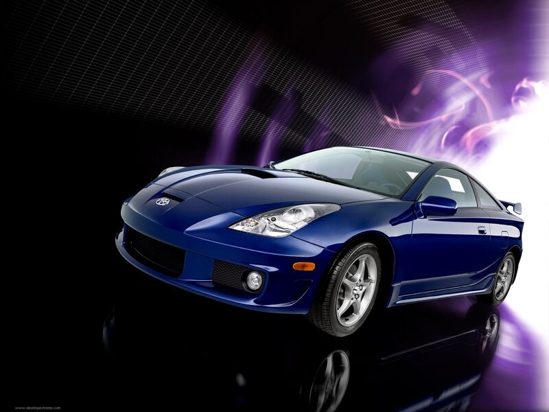 Blue sports car on dark background