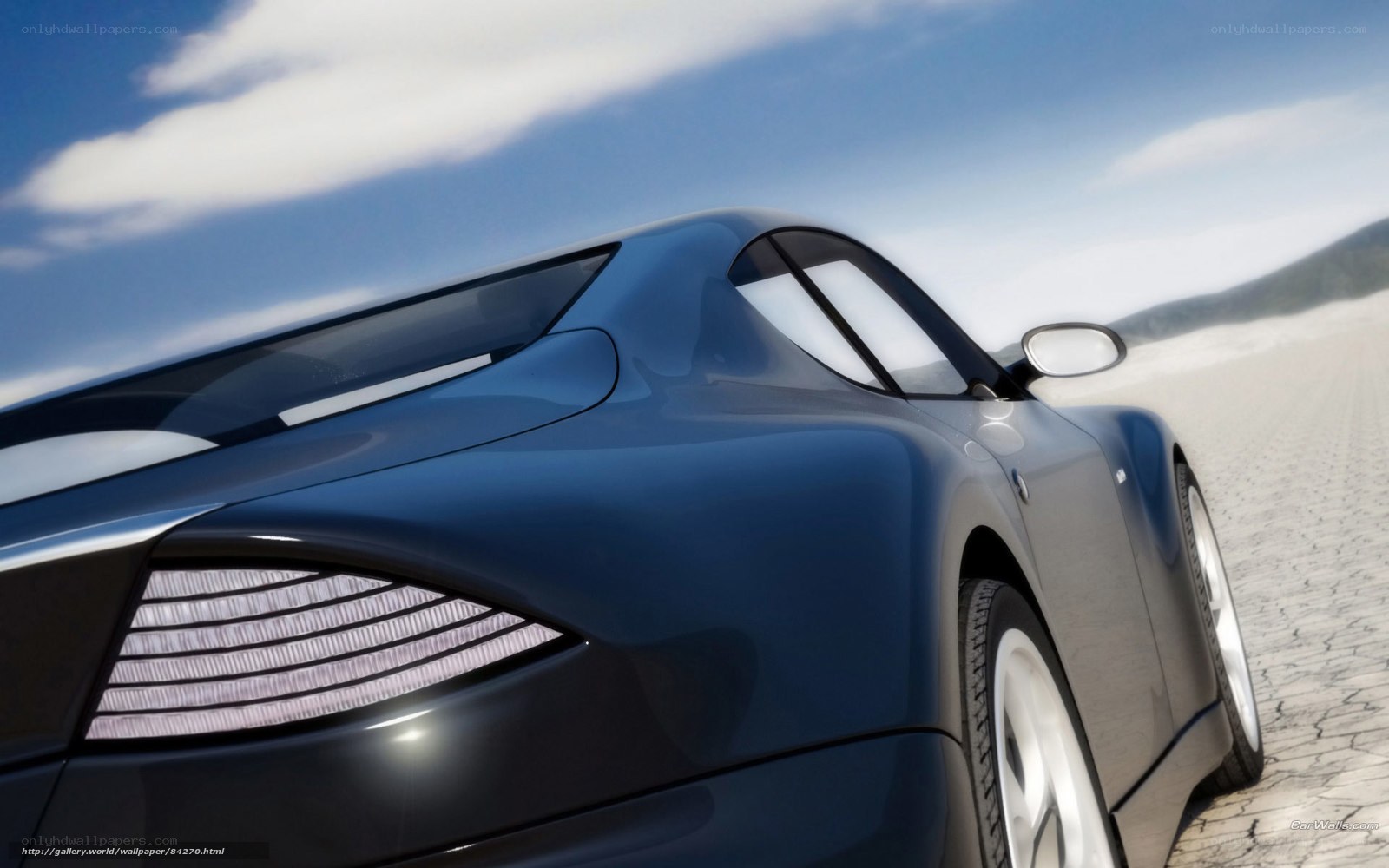 blue sports car on desert road
