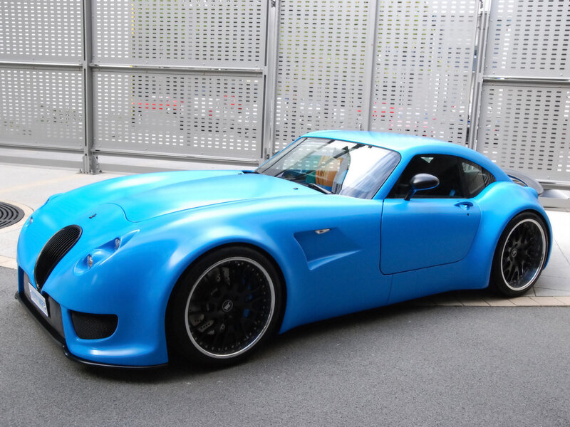 blue sports car on display