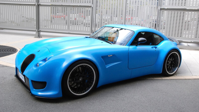 blue sports car on display