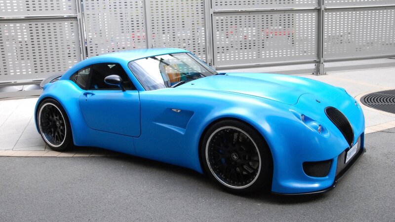 blue sports car on display