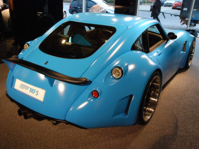 blue sports car on display