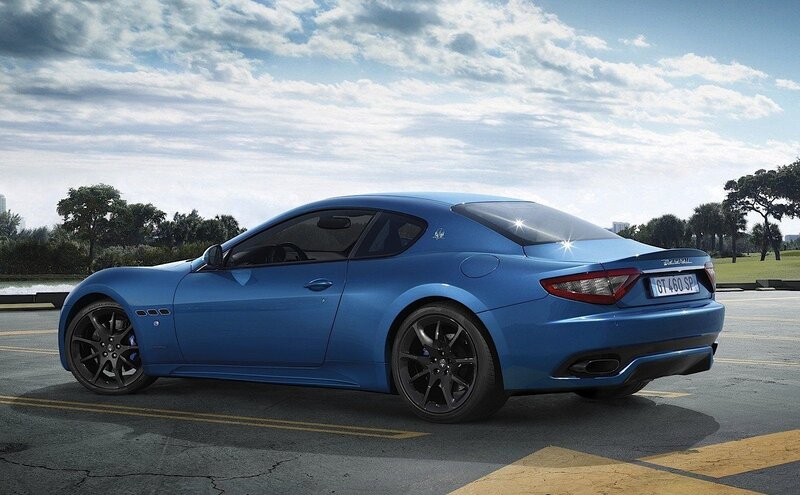 blue sports car on pavement