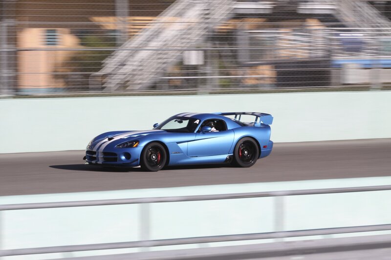 Blue sports car on racetrack