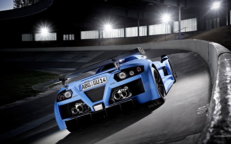 blue sports car on racetrack