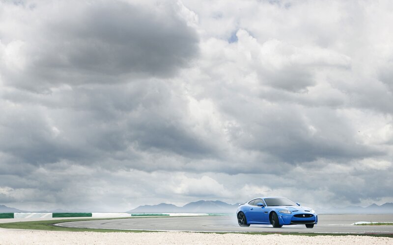 Blue sports car on racetrack