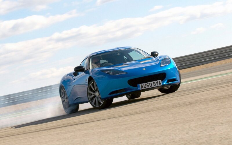 Blue sports car on racetrack