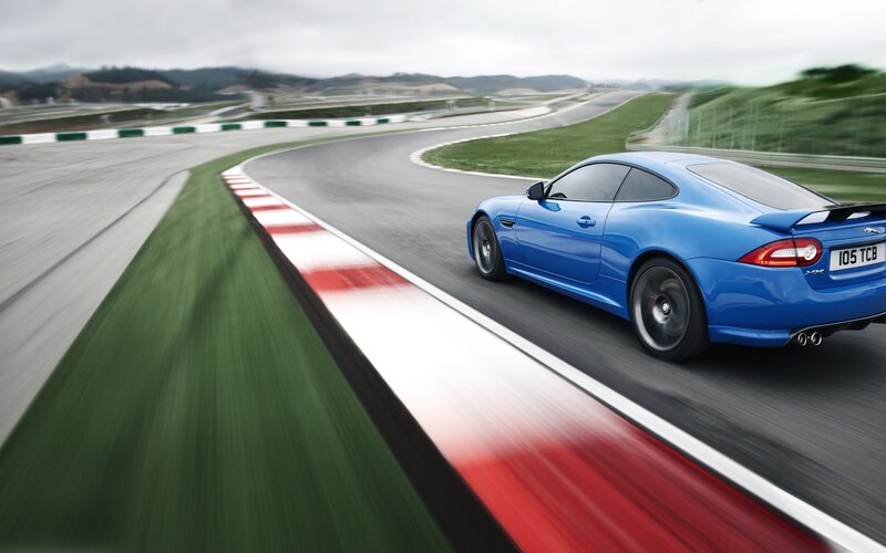 Blue sports car on racetrack