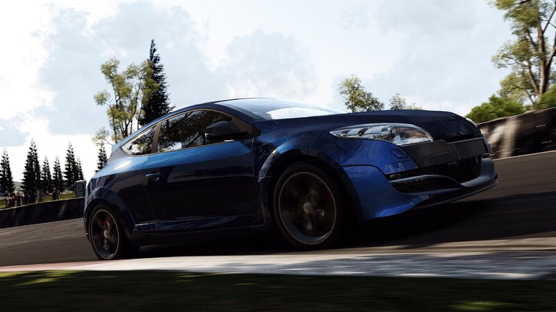 blue sports car on racetrack