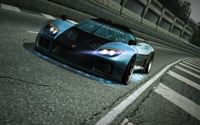 blue sports car on racetrack