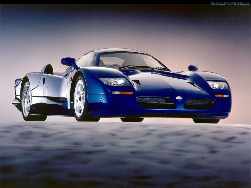 blue sports car on reflective surface