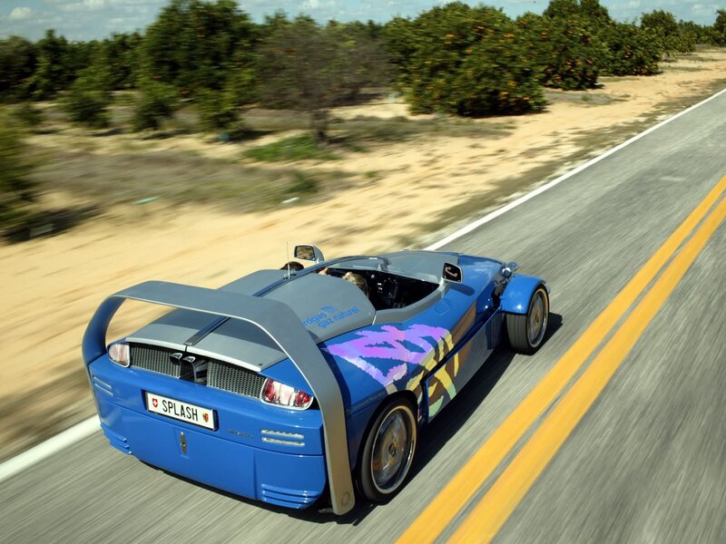 blue sports car on road