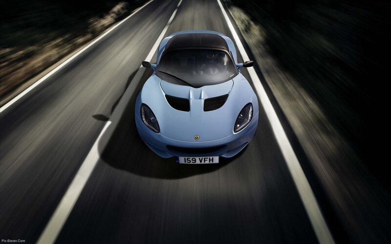 blue sports car on road