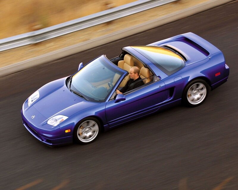 blue sports car on road