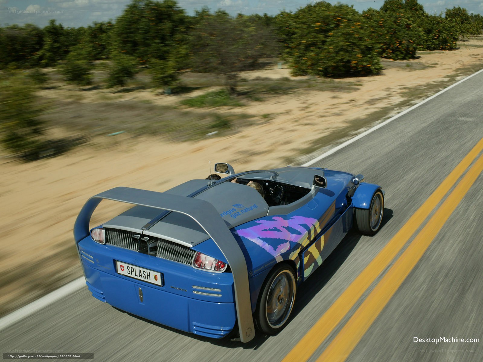 blue sports car on road