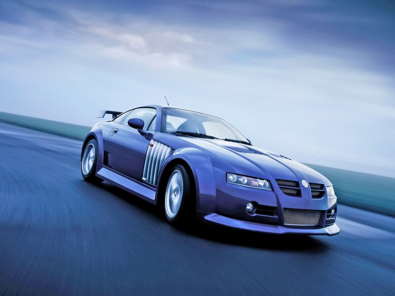 blue sports car on road