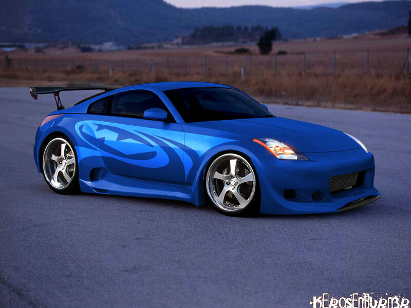 blue sports car on road