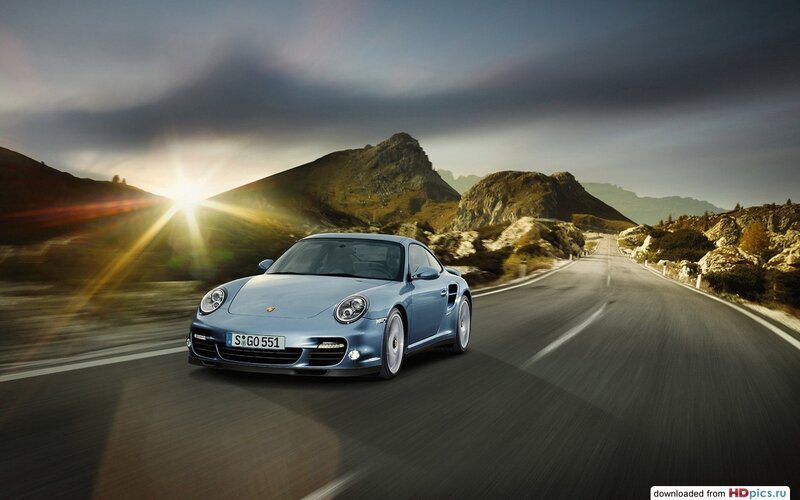 Blue Sports Car on Road — Dramatic