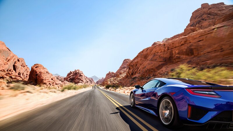 Blue Sports Car on Road — Dynamic, Afternoon, Photograph
